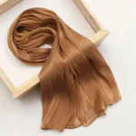 Structured organza silk hijab with a glossy finish. Clothifydotpk
