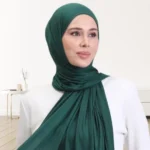 A woman wearing a draped jersey hijab. Clothifydotpk