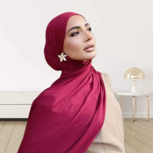 A woman wearing a draped jersey hijab. Clothifydotpk