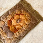 A kids prayer mat with a colorful and playful design at Clothifydotpk.com