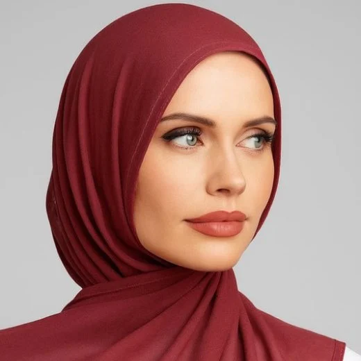 A woman comfortably wearing a modal hijab, highlighting the fabric's fluid drape. Clothifydotpk