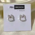 Close-up of an elegant pin brooch, used to stylishly secure a hijab. Clothifydotypk
