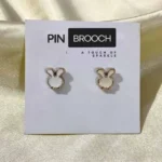 Close-up of an elegant pin brooch, used to stylishly secure a hijab. Clothifydotypk