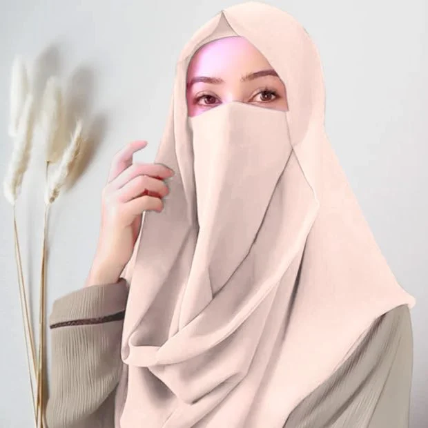 Plain Misri_Hijab-3282 - 34 A woman wearing a simply draped Misri hijab Niqab, with the ends flowing over her shoulder. Clothifydotpk
