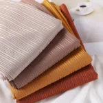 A folded ribbed jersey hijab in a neutral color. Clothifydotpk