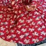 A woman using a Winter Namaz Chadar, performing namaz. Clothifydotpk