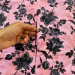 A woman using a Winter Namaz Chadar, performing namaz. Clothifydotpk