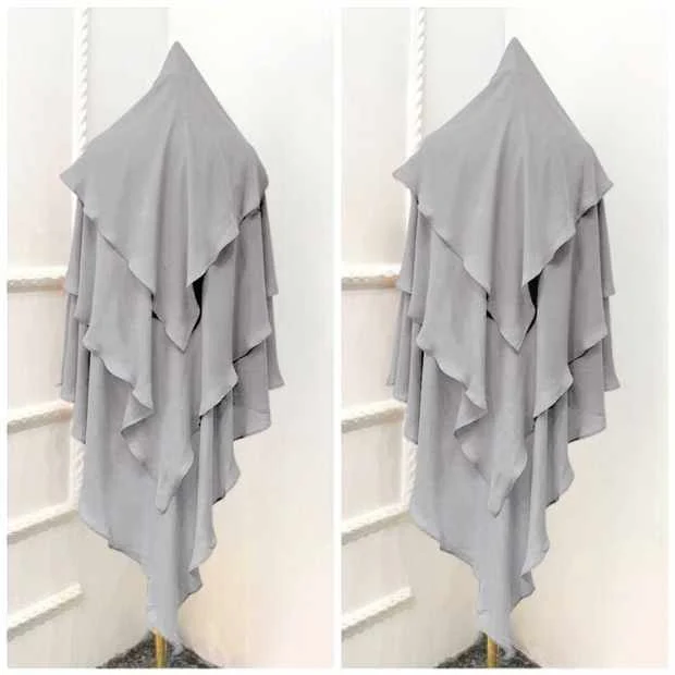 A flowing three layer khimar Hijab, made of three separate layers of chiffon. By Clothifydotpk