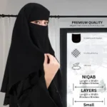 A woman wearing a premium black three layer niqab. By Clothifydotpk