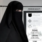 A woman wearing a premium black three layer niqab. By Clothifydotpk