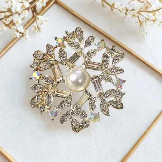 Brooch_FY0130 - 47 A floral brooch in shades of silver. By Clothifydotpk