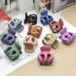 The sleek, ergonomic design of mini pumpkin hair claw clip Clothifydotpk
