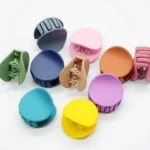 The sleek, ergonomic design of round mini hair claw clip Clothifydotpk