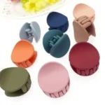 The sleek, ergonomic design of round mini hair claw clip Clothifydotpk