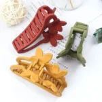 The sleek, ergonomic Floral design of hair claw clip Clothifydotpk