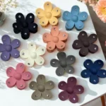 The sleek, ergonomic design of flower Rhinestone hair claw clip Clothifydotpk