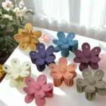 The sleek, ergonomic design of flower Rhinestone hair claw clip Clothifydotpk