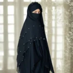 A women wearing Fancy Khimar with Pearls. By Clothifydotpk