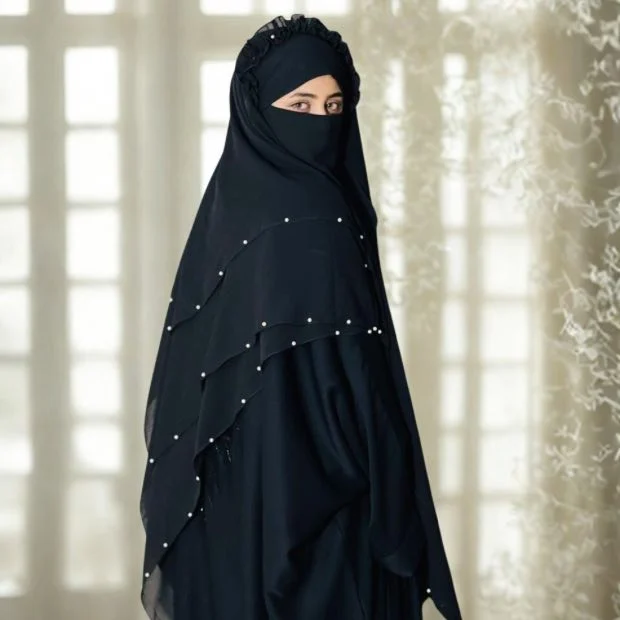 A women wearing Fancy Khimar with Pearls. By Clothifydotpk