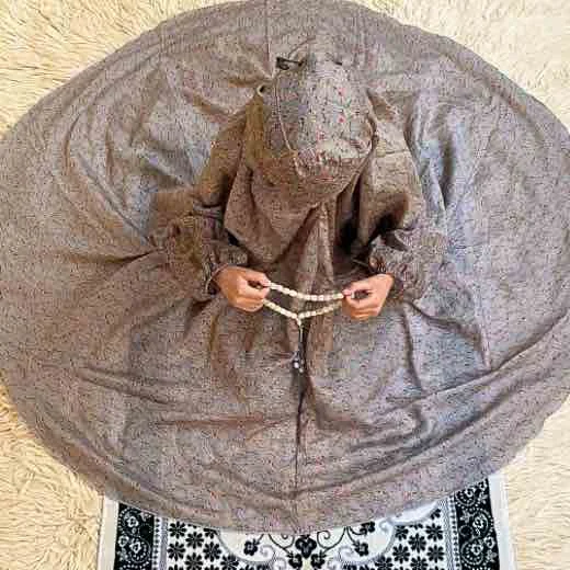 Kids_Umbrella_6282 - 50 a kid wearing namaz chadar with sleeves offering salah. By Clothifydotpk