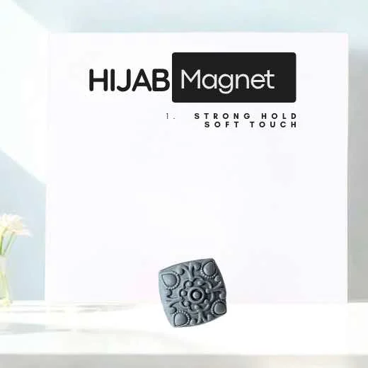 A pair of two small, discreet magnetic pins designed to securely fasten a hijab without snags or holes By Clothifydotpk