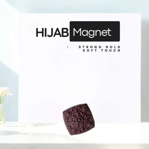 A pair of two small, discreet magnetic pins designed to securely fasten a hijab without snags or holes By Clothifydotpk