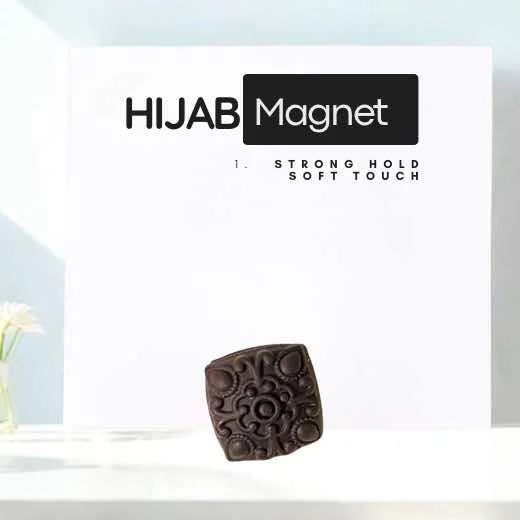 A pair of two small, discreet magnetic pins designed to securely fasten a hijab without snags or holes By Clothifydotpk