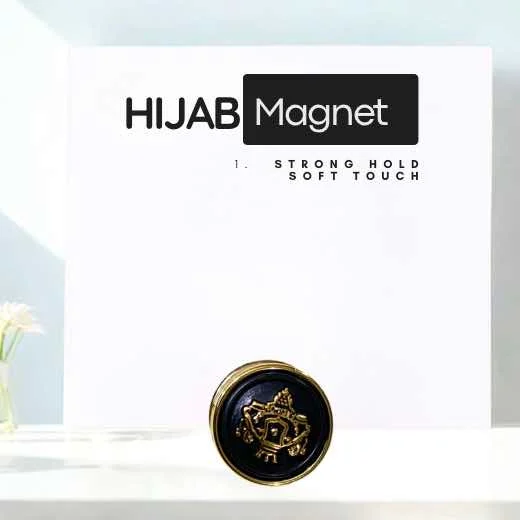 A pair of two discreet Hijab magnet pins designed to securely fasten a hijab without snags or holes By Clothifydotpk
