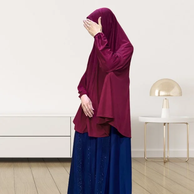 Sleeves Makhna_846 - 16 A woman wearing a jersey makhna hijab, providing full coverage for the head, neck, and shoulders without pins. CLOTHIFYDOTPK