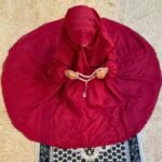 a kid with plain namaz chadar with sleeves offering salah. By Clothifydotpk