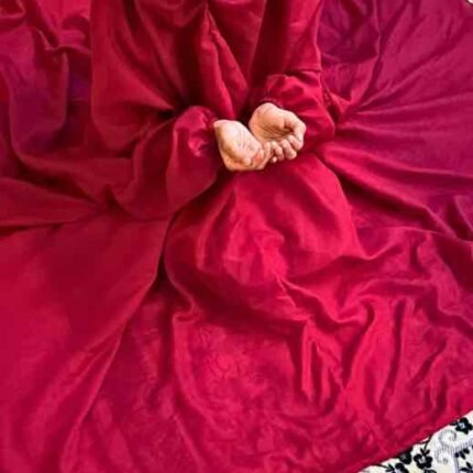 a kid with plain namaz chadar with sleeves offering salah. By Clothifydotpk