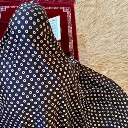 A woman's namaz chadar without sleeves.