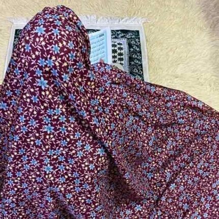 A woman's large size namaz chadar without sleeves.