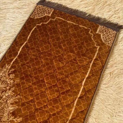 A premium prayer mat with a thick, quilted design for comfort and a non-slip base