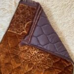 A premium prayer mat with a thick, quilted design for comfort and a non-slip base
