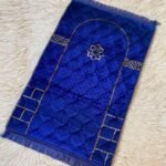 A premium prayer mat with a thick, quilted design for comfort and a non-slip base