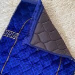 A premium prayer mat with a thick, quilted design for comfort and a non-slip base
