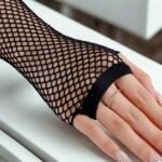 Stretchy, netted fabric arm sleeves.