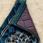 Kid's quilted Islamic prayer mat.