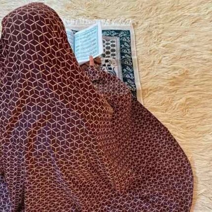 A woman's namaz chadar without sleeves.
