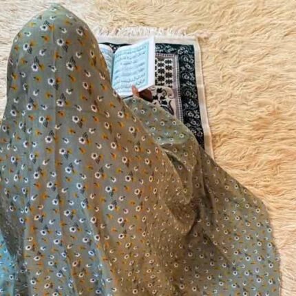 A woman's namaz chadar without sleeves.