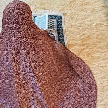A woman's namaz chadar without sleeves.