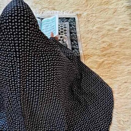 A woman's namaz chadar without sleeves.