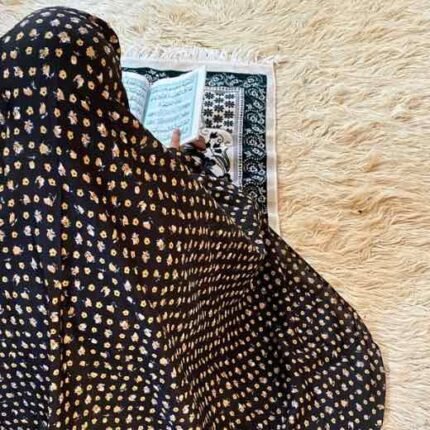 A woman's namaz chadar without sleeves.