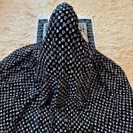 A woman's namaz chadar without sleeves.