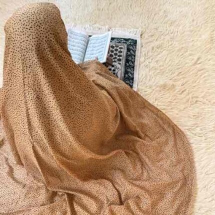 A woman's namaz chadar without sleeves.