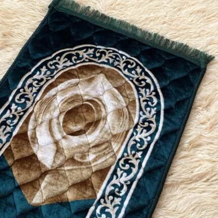 A premium prayer mat with a thick, quilted design for comfort and a non-slip base