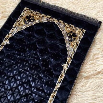 A beautifully patterned premium quilted padded prayer mat laid out flat By Clothifydotpk