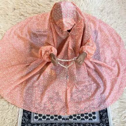 a Kid wearing namaz chadar with sleeves for offering prayers