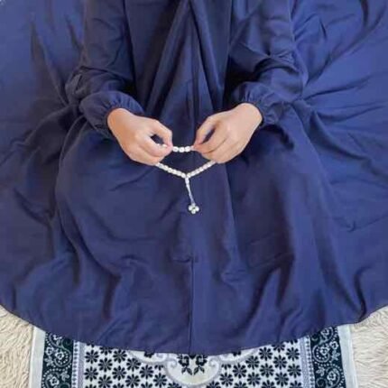 a Kid wearing plain namaz chadar with sleeves for offering prayers
